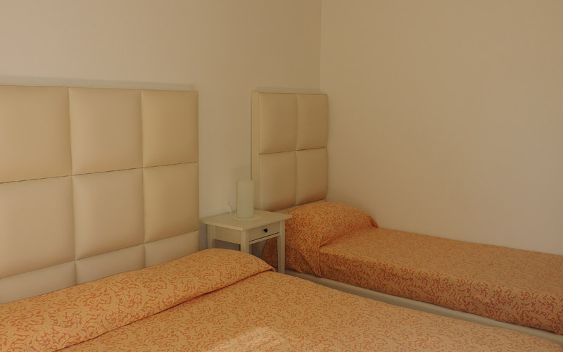 Camera da letto dell'appartamento Agapanto